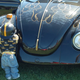 Image for article titled Why do car collectors put creepy dolls on their bumpers?